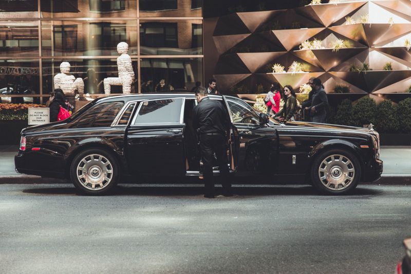 Jet black Suburban or Yukon Denali Ultimate with chauffeur in New York